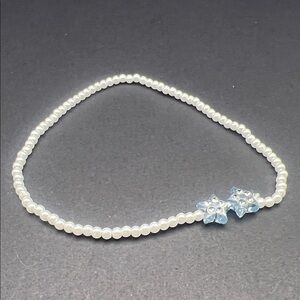 Elegant Pearl and Blue Star Bracelet